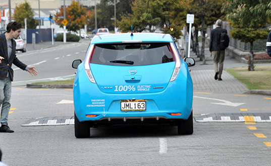 An electric vehicle driving - photo by John Roxborough.